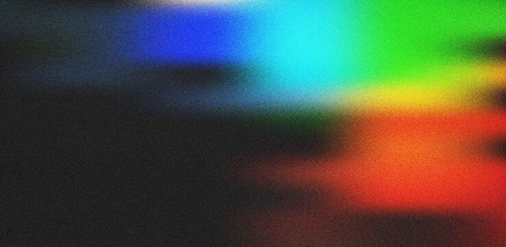 Dark abstract background with bright glowing light streaks and vibrant spectrum colors creating a dynamic visual effect