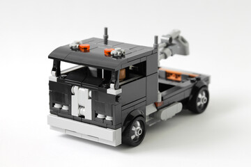 Fototapeta premium Lego black tow truck toy