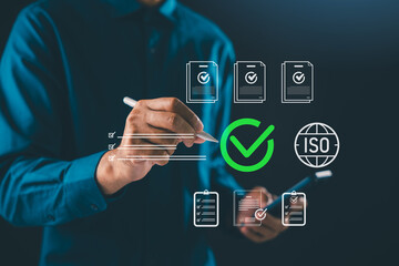 Obraz premium Hand laptop iso certification document approval quality control compliance management international standard assurance business process ensures productivity, improving professional workflow