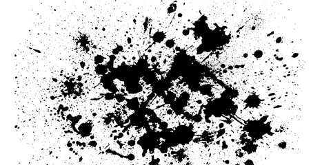 Fototapeta premium A dynamic explosion of black ink splatters creates an abstract pattern, evoking a sense of chaos and artistic expression.