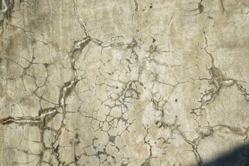 Fototapeta premium Weathered cracked wall texture.