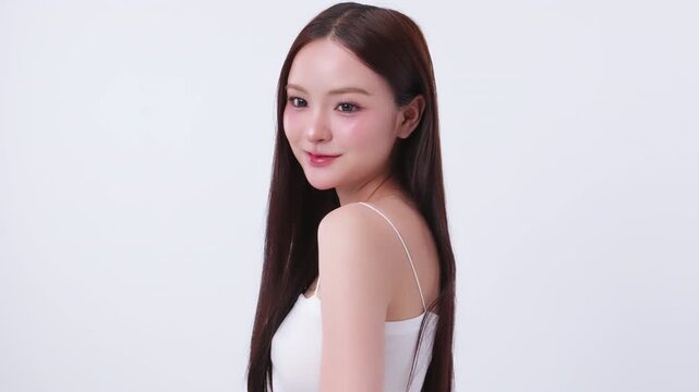 Beautiful young Asian woman with K beauty style makeup and perfect skin. Facial and skin care concept for commercial advertising.