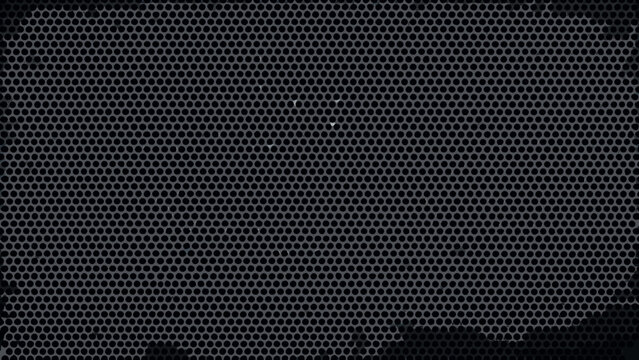 Perforated metal sheet with circular holes dark industrial texture