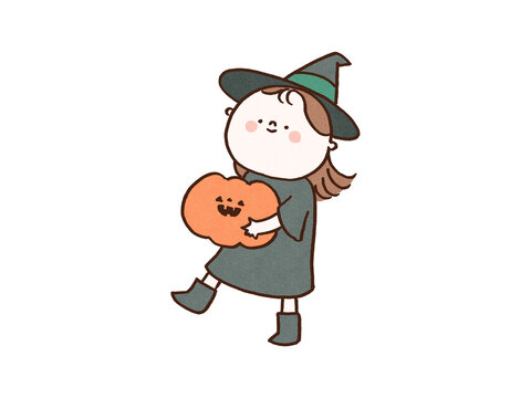 Girl dressed as a witch holding a jack-o-lantern, happy Halloween or autumn event concept