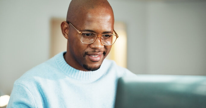 Review, smile or black man with laptop for remote work, accounting audit or internal risk evaluation. Reading, freelancer and financial controller with check for compliance policy, computer and home