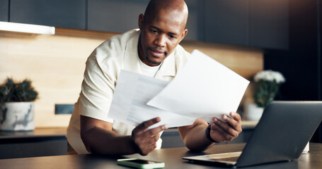 Review, paperwork and man with finance in home for statement balance, utility bills or planning....