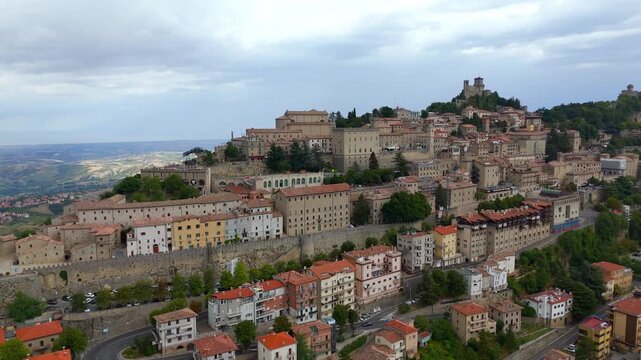 Aerial view of San Marino historic city and medieval towers on Monte Titano