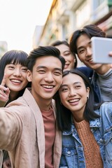 Obraz premium Group of friends taking selfie city street social media content urban environment cheerful viewpoint