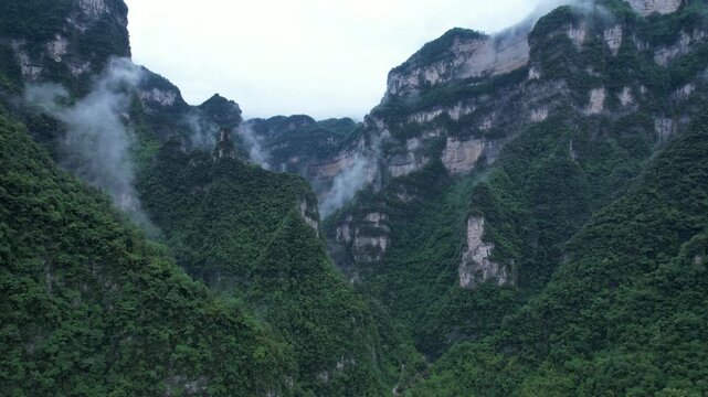 Misty Karst Mountains and Green Valley
