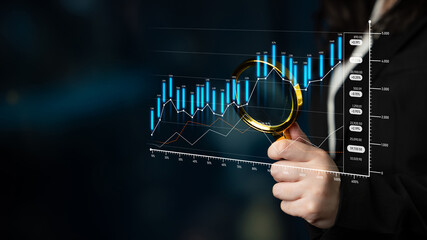 A business expert examines a financial chart with a magnifying glass to highlight trends and market...