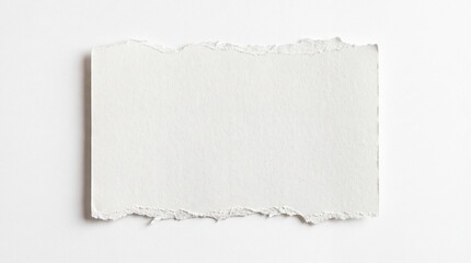 Fototapeta premium A piece of torn white paper with ragged edges