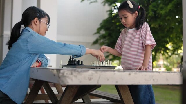 Smart Asian Sibling Pupils Practicing Mental Arithmetic Strategy