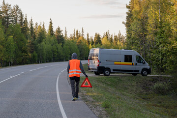 Person with warning triangle and broken down van © Cavan