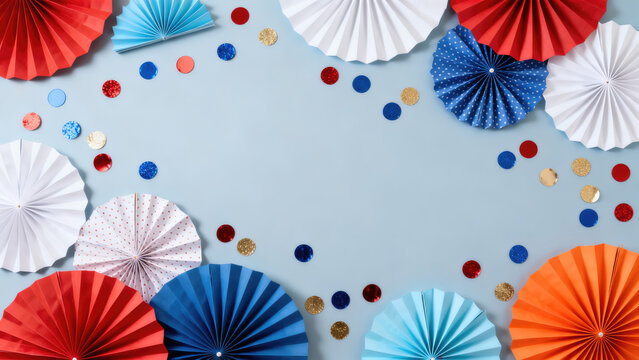 4th of july happy independence day usa concept paper fans,foil balloons in american flag colors on blue background top view flat lay.