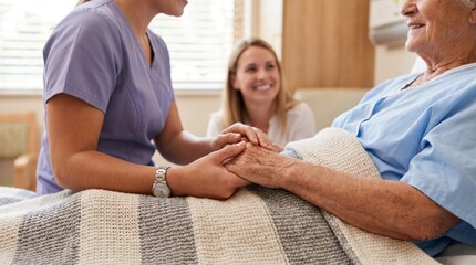 Fototapeta premium Nurse provides compassionate care and emotional support to an elderly female patient resting in a hospital bed during a scheduled wellness visit.