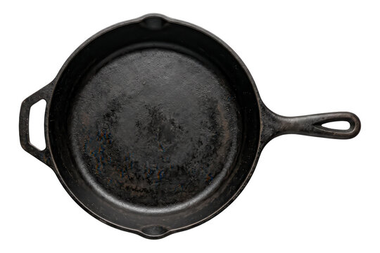 Empty cast iron skillet with handle isolated on transparent background