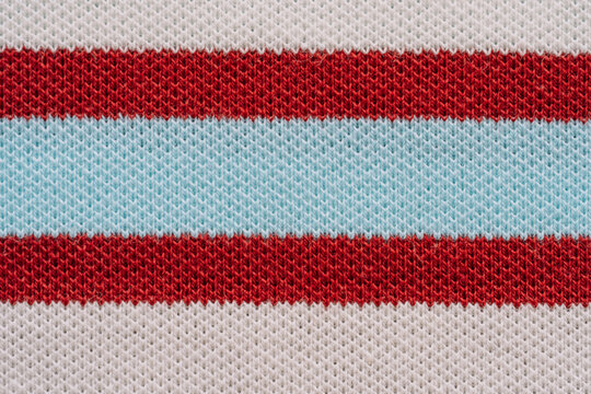 Striped fabric texture in red blue and white.