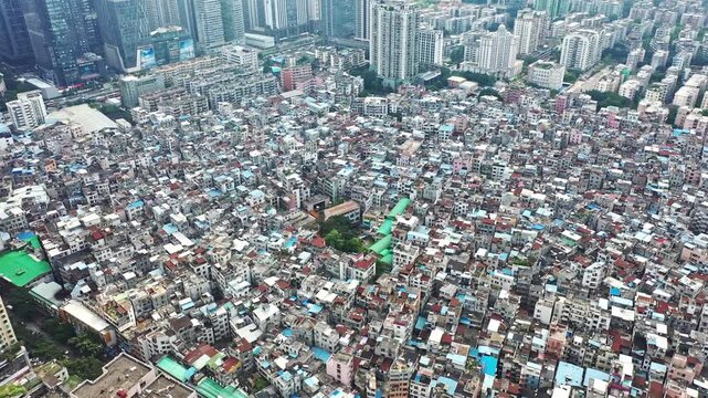 Aerial view of dense urban residential district and skyscrapers in China
