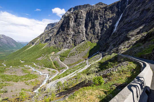 Trollstigen with waterfalls and mountains and winding roads, Norway