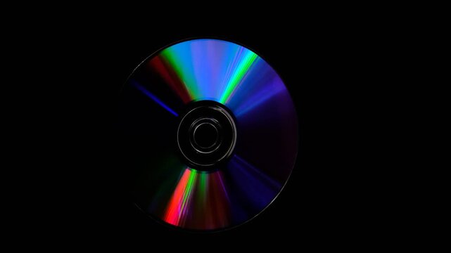 Rainbow light reflecting of a surface of a rotating CD-DVD disk