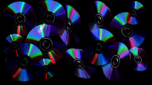 Rainbow light reflecting of a surface of a rotating CD-DVD disk