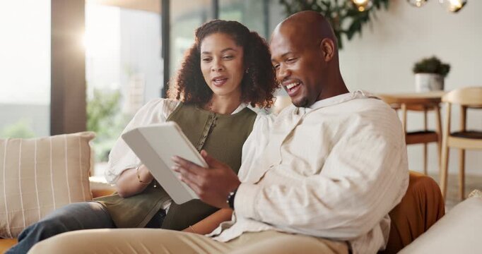 Streaming, tablet and couple on sofa with laugh, funny series and comic post on social media. Happy, digital or African people in home with tech, comedy show or bonding together with humor connection