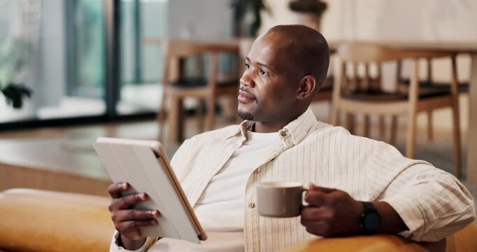 Black man, reading and remote work in home with tablet, research and proofreading for copywriting. Journalist, coffee and freelancer in lounge with digital app, editing article and story publication