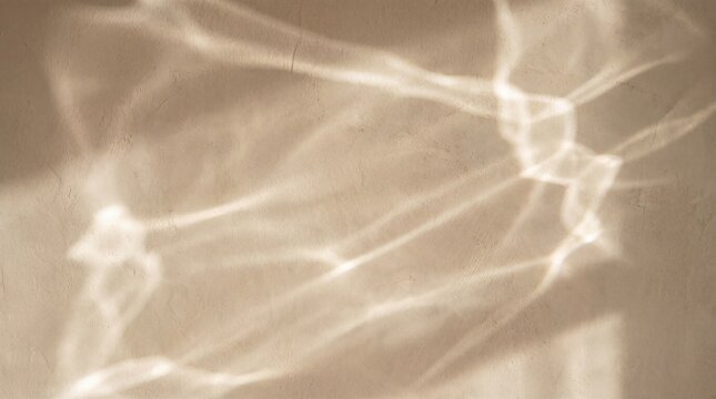 Aesthetic beige plaster wall background with soft water ripple shadow projection. Minimalist organic caustic mockup banner.
