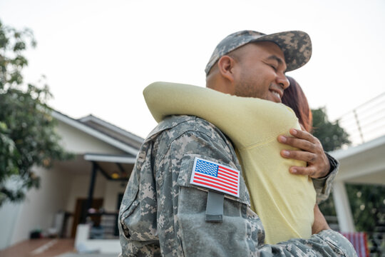 A veteran returning home from battle to see his wife and loved one embraced with affection upon meeting her. The hero, wounded while protecting his country, returned to his loved one to rest.