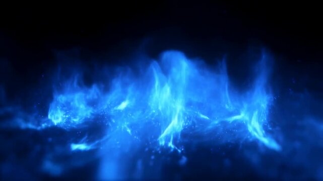 Slow motion close up of blue flame rising and flickering against black background in low light studio setting