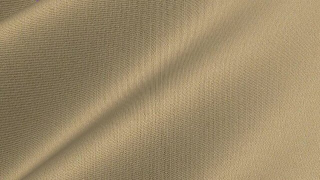 Italian Beige Cotton Stretch Fabric rippling in clean waves of flexible twill weave and soft neutral tan color tone for comfortable trousers