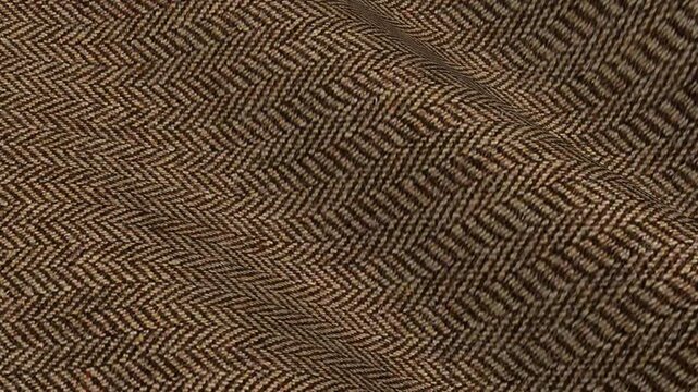 Irish Brown Herringbone Tweed Fabric shifting in rich waves of traditional autumn wool texture and earthy melange pattern for tailored jackets