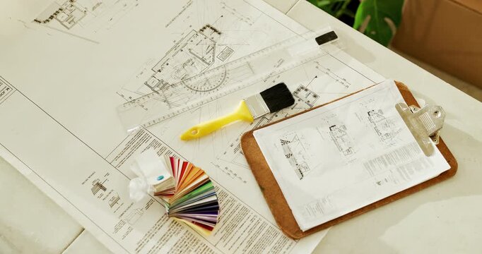 Renovation, architecture or blueprint on table with clipboard, construction or building industry. Floor plan, paperwork or empty with swatches, interior design or tools for infrastructure development