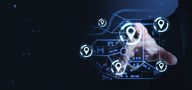 Digital location tracking interface with glowing navigation icons over abstract map and hand interaction for modern business technology concept.