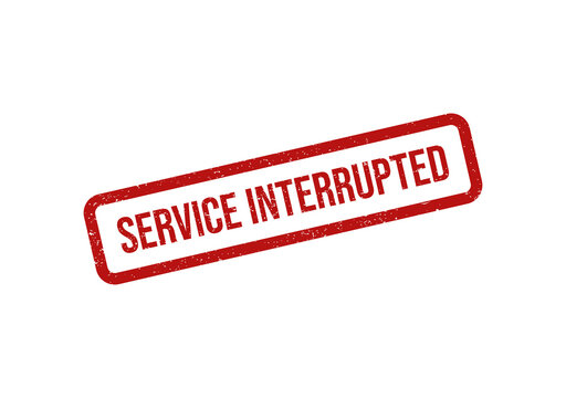 Red rubber stamp with the text service interrupted on a tilted label