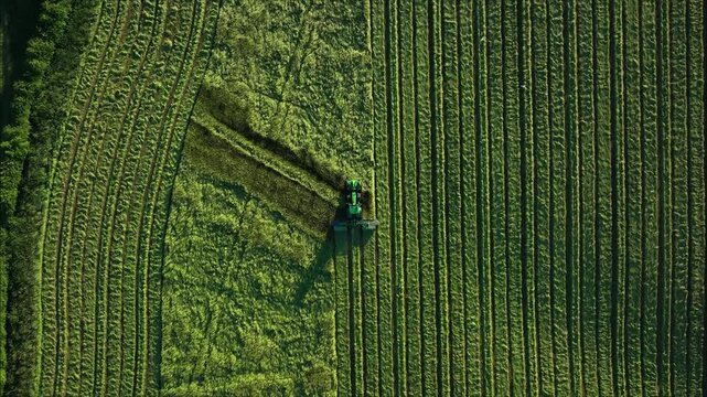 Tractor at Work in the Fields. Drone Footage of Modern Farming Operations