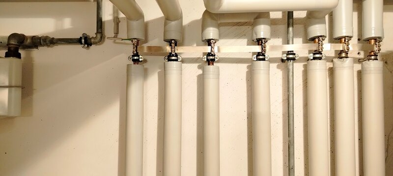 Industrial Water Piping System with Insulation and Grounding 