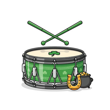 Green drum with shamrock and sticks.