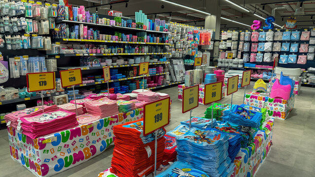 Colorful supermarket display of kids bedding and towels under bright lights suitable for retail marketing, e commerce, social media and catalogs, 5 May 2026 Subitica, Serbia