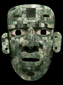 Mayan jade funeral mask, intricate mosaic of green jade pieces, obsidian eyes, pyrite mirror accents, royal burial artifact, Pakal style, museum quality lighting, isolated on black 