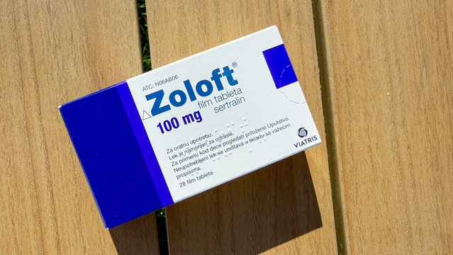 Zoloft 100 mg box on wood in natural light for medical editorial, healthcare content, patient education and social media use, 5 May 2026 Subitica, Serbia