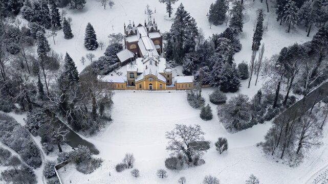 W&ouml;rlitzer Park with view of the Gothic House, winter atmosphere, snow, ice, frost, winter wonderland, church, Dessau-W&ouml;rlitz garden kingdom, tourist attraction, UNESCO World Heritage Site, travel destination, Prince Frederick Francis of Anhalt-Dessau, Dessau-W&ouml;rlitz Cultural Foundation, UNESCO World Heritage Site, Middle Elbe Biosphere Reserve, Saxony-Anhalt, Germany