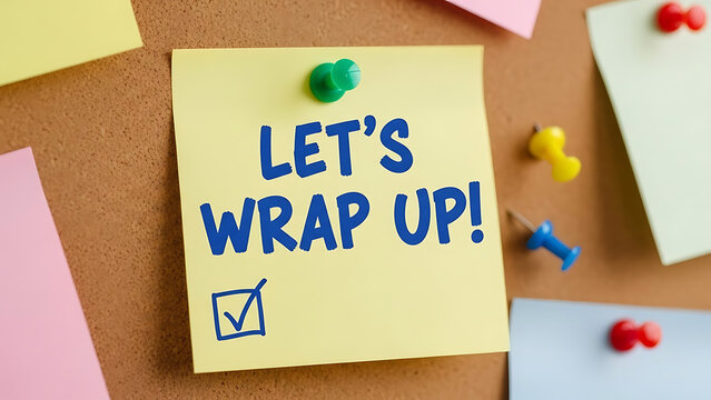 Handwritten Let's Wrap Up message on yellow adhesive sticky note representing professional business meeting summary project task completion final conclusion and office deadline achievement
