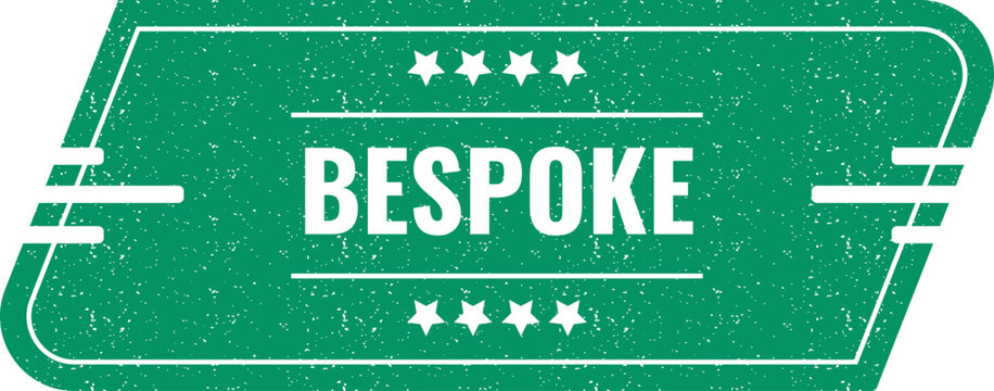 Green rubber stamp with the word BESPOKE printed in the center for high end services