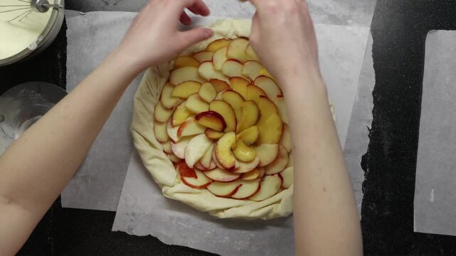 Messy kitchen countertop during creative process of baking fruit pastry