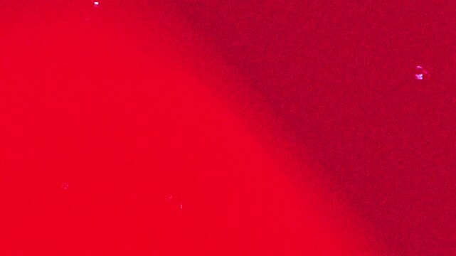 Authentic Analog Film Grain Texture with Vertical Scratches and Warm Light Leaks for Nostalgic Cinematic Projects 4k video