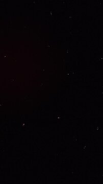 Vertical Analog Film Grain Overlay with Red Light Leaks and Dust Scratches 4k video