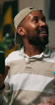 Man, waiter or phone with pos machine in bar for payment, wireless transaction or service. Male person, customer or payer with friends or smartphone tap for alcohol drinks, beer or tab in night pub