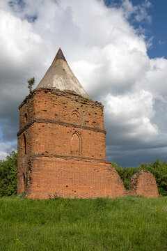 Pencil Tower is close-up on the territory of an old abandoned fortress. Saburovo, Oryol region, Russia (vertical)