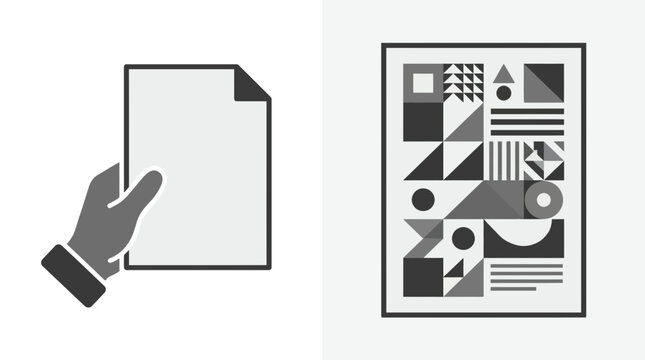 A hand holding a blank document next to a framed abstract geometric art print.
